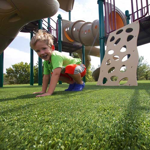 Boy Playing on SynLawn Playground
