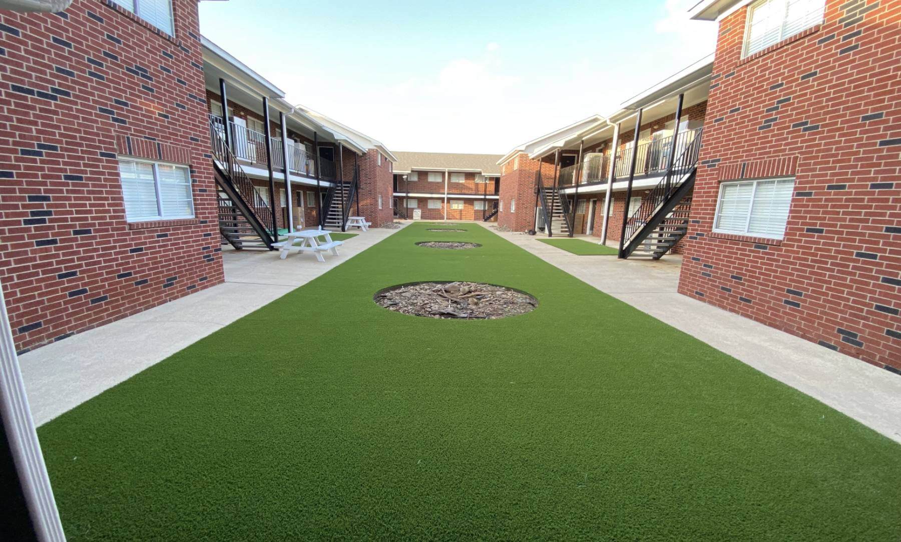 etbu-footer East Texas Baptist university artificial grass common area