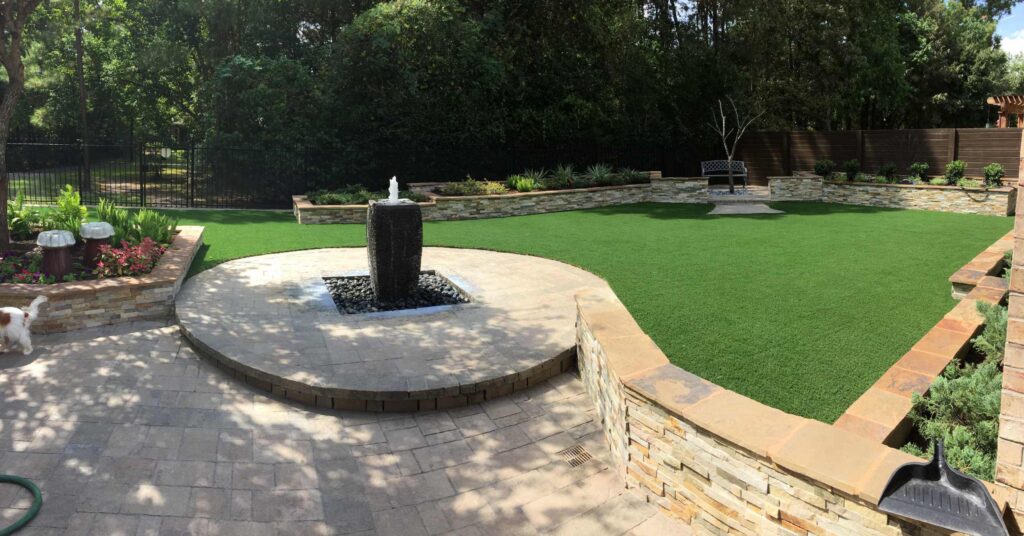 Fountain area with artificial grass