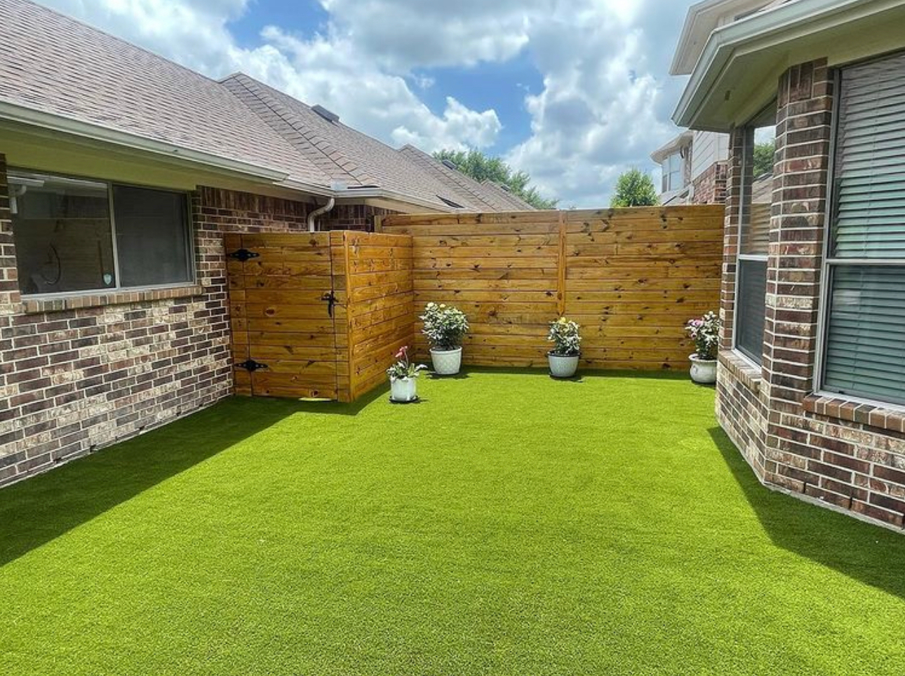 20220505_165742000_iOS residential artificial grass backyard lawn synlawn austin