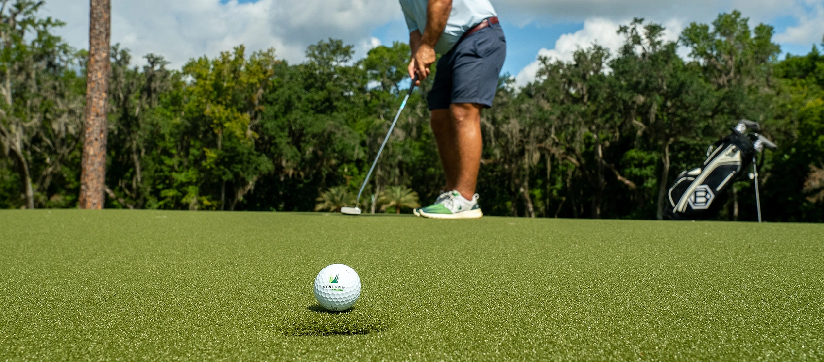 synlawn-austin-waco-artificial-grass-3 Golfer Putting on Waco, TX Putting Green Turf from SYNLawn